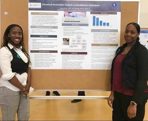 Nursing students presenting at research and scholarship day